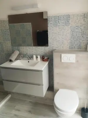 Salle de bains dans l'établissement Hostellerie du Beffroy