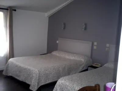 Un ou plusieurs lits dans un hébergement de l'établissement Le Ranfort Chambres d'Hôtes