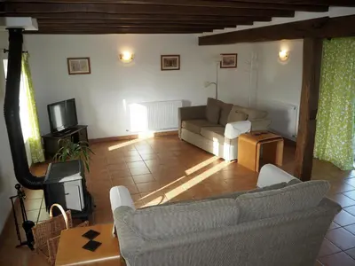 Télévision ou salle de divertissement dans l'établissement Villas de Leypinas Gites