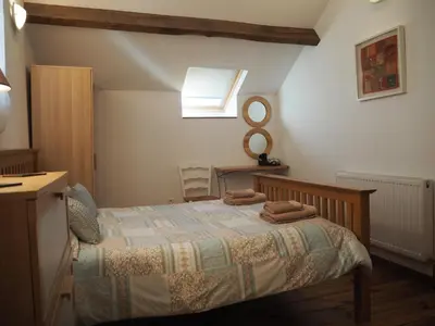 Un ou plusieurs lits dans un hébergement de l'établissement Villas de Leypinas Gites