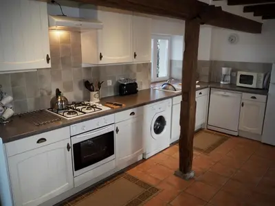 Cuisine ou kitchenette dans l'établissement Villas de Leypinas Gites