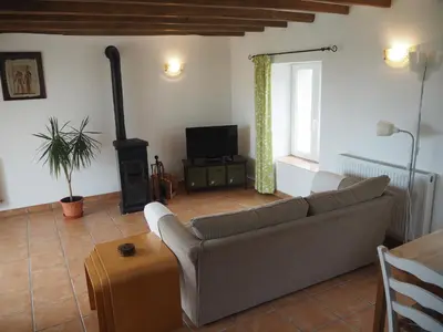 Coin salon dans l'établissement Villas de Leypinas Gites