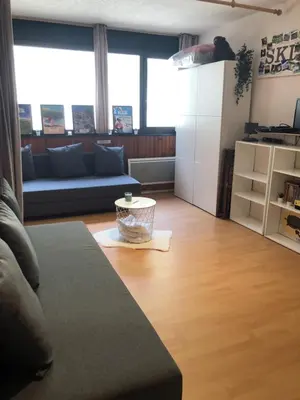 Coin salon dans l'établissement Appartement Super Besse