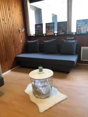 Coin salon dans l'établissement Appartement Super Besse