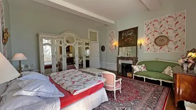 Un ou plusieurs lits dans un hébergement de l'établissement Château de la Chabroulie