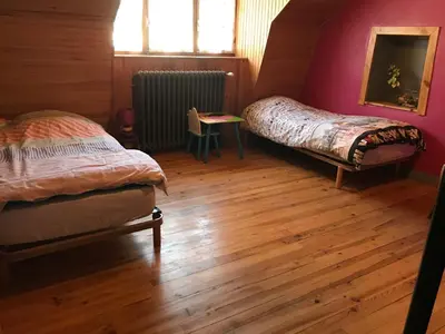 Un ou plusieurs lits dans un hébergement de l'établissement gite chez Régine