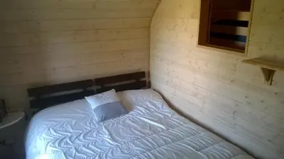 Un ou plusieurs lits dans un hébergement de l'établissement Le gîte de Chomet