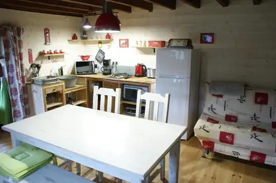 Cuisine ou kitchenette dans l'établissement Le gîte de Chomet