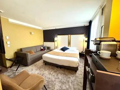 Un ou plusieurs lits dans un hébergement de l'établissement Best Western Hotel Le Quercy