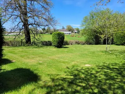 Jardin de l'établissement Stacaravan 6 persoons - Camping Le Soustran