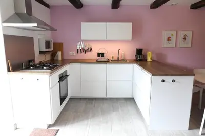 Cuisine ou kitchenette dans l'établissement Le Four à Pain