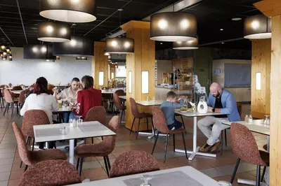 Restaurant ou autre lieu de restauration dans l'établissement Belambra Clubs Superbesse - Le Chambourguet