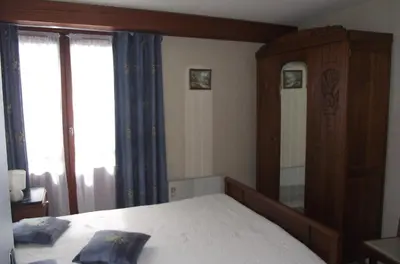 Un ou plusieurs lits dans un hébergement de l'établissement Appartement les Domes