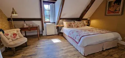 Un ou plusieurs lits dans un hébergement de l'établissement Les Granges Hautes Chambre d'hôtes de charme proche Sarlat