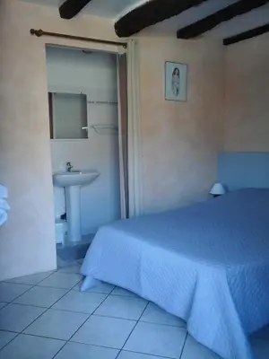 Un ou plusieurs lits dans un hébergement de l'établissement La Tour