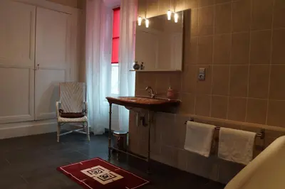 Coin salon dans l'établissement Château de Savennes - Caveau de sabrage