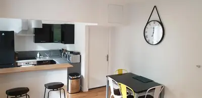 Cuisine ou kitchenette dans l'établissement Ptit Savoy