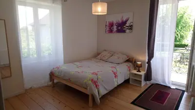 Un ou plusieurs lits dans un hébergement de l'établissement Appartement Duplex