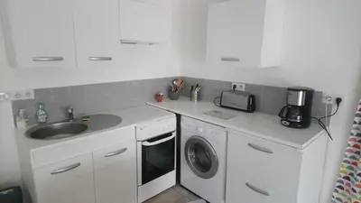 Cuisine ou kitchenette dans l'établissement Appartement Duplex