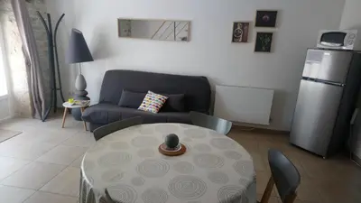 Coin salon dans l'établissement Appartement Duplex