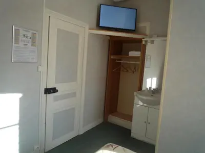 Télévision ou salle de divertissement dans l'établissement Au Relais du Parc de Millevaches