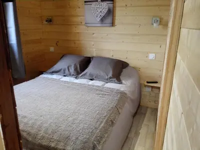 Un ou plusieurs lits dans un hébergement de l'établissement Le chalet douillet