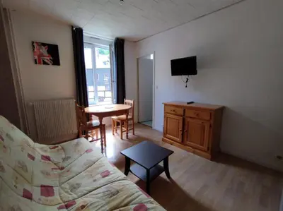 Télévision ou salle de divertissement dans l'établissement Hôtel de Londres