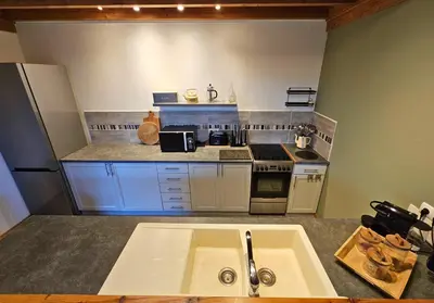Cuisine ou kitchenette dans l'établissement L'Horizon - Domaine du Vertendre