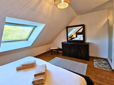 Télévision ou salle de divertissement dans l'établissement L'Horizon - Domaine du Vertendre