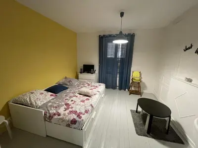 Un ou plusieurs lits dans un hébergement de l'établissement Bienvenu chez Zazou