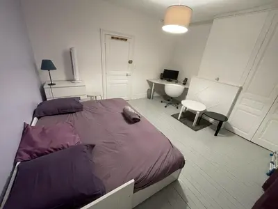 Un ou plusieurs lits dans un hébergement de l'établissement Bienvenu chez Zazou