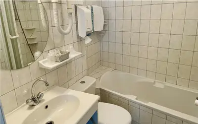 Salle de bains dans l'établissement Hotel De La Poste