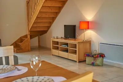 Télévision ou salle de divertissement dans l'établissement Domaine de Lanzac