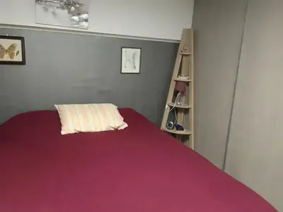 Un ou plusieurs lits dans un hébergement de l'établissement la maison bonheur