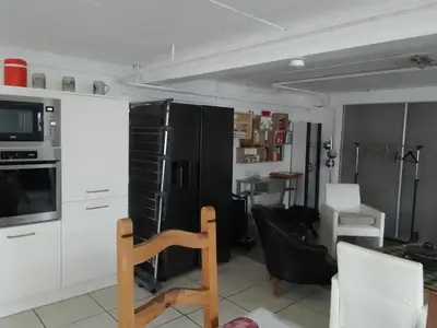 Cuisine ou kitchenette dans l'établissement la maison bonheur