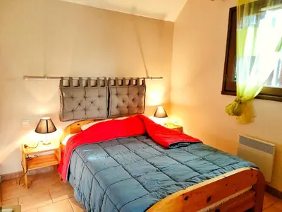 Un ou plusieurs lits dans un hébergement de l'établissement Rivière & Cottage 4 étoiles en Auvergne - Cantal Auvergne - Valette & Riom PR
