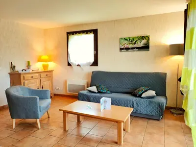 Coin salon dans l'établissement Rivière & Cottage 4 étoiles en Auvergne - Cantal Auvergne - Valette & Riom PR