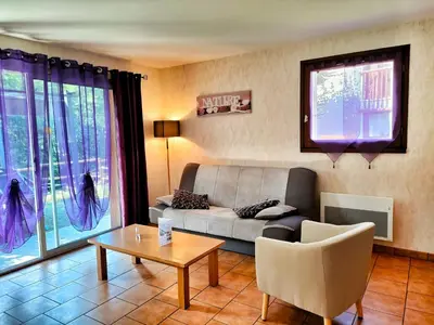 Coin salon dans l'établissement Rivière & Cottage 4 étoiles en Auvergne - Cantal Auvergne - Valette & Riom PR