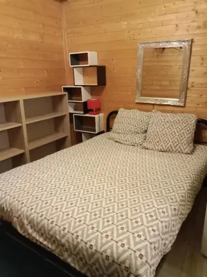 Un ou plusieurs lits dans un hébergement de l'établissement Gîte au pied des volcans d'Auvergne Aydat