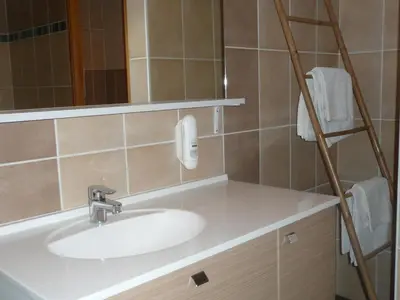 Salle de bains dans l'établissement Residence L'Etoile du Sancy