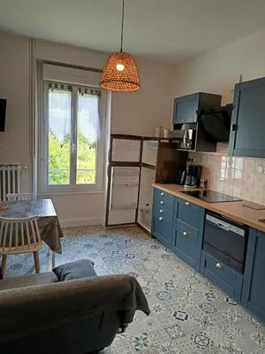 Cuisine ou kitchenette dans l'établissement Doux Ombrages