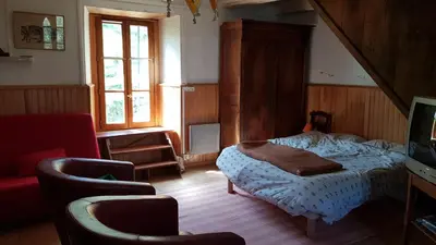 Un ou plusieurs lits dans un hébergement de l'établissement Maison du pays de Salers dans le parc des volcans d'Auvergne