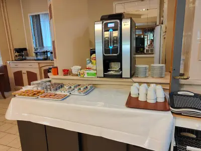 Cuisine ou kitchenette dans l'établissement Hotel Au Val Doré