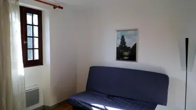 Coin salon dans l'établissement Gîte au calme avec point de vue proche Turenne