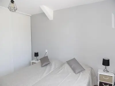Un ou plusieurs lits dans un hébergement de l'établissement Maison de Vacances Le Ranfort