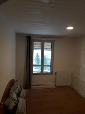 Un ou plusieurs lits dans un hébergement de l'établissement maison cosy proche de la station de ski du lioran 4 personnes