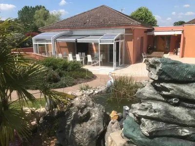 Jardin de l'établissement Chambres d'Hôtes La Coloniale