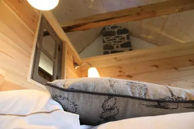 Un ou plusieurs lits dans un hébergement de l'établissement Les Volca'lodges de Tournebise