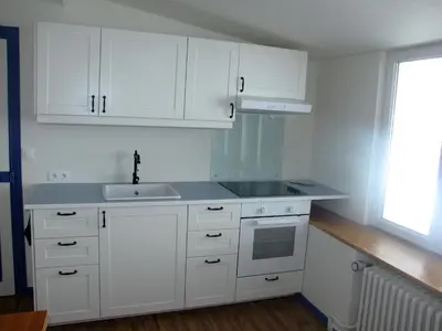 Cuisine ou kitchenette dans l'établissement Les Camélias
