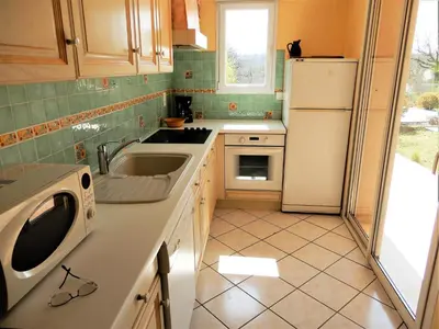Cuisine ou kitchenette dans l'établissement La Balme